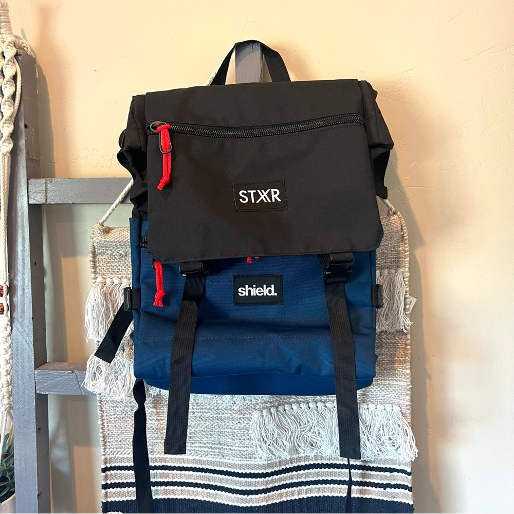 New without tags- STXR Shield backpack black blue.